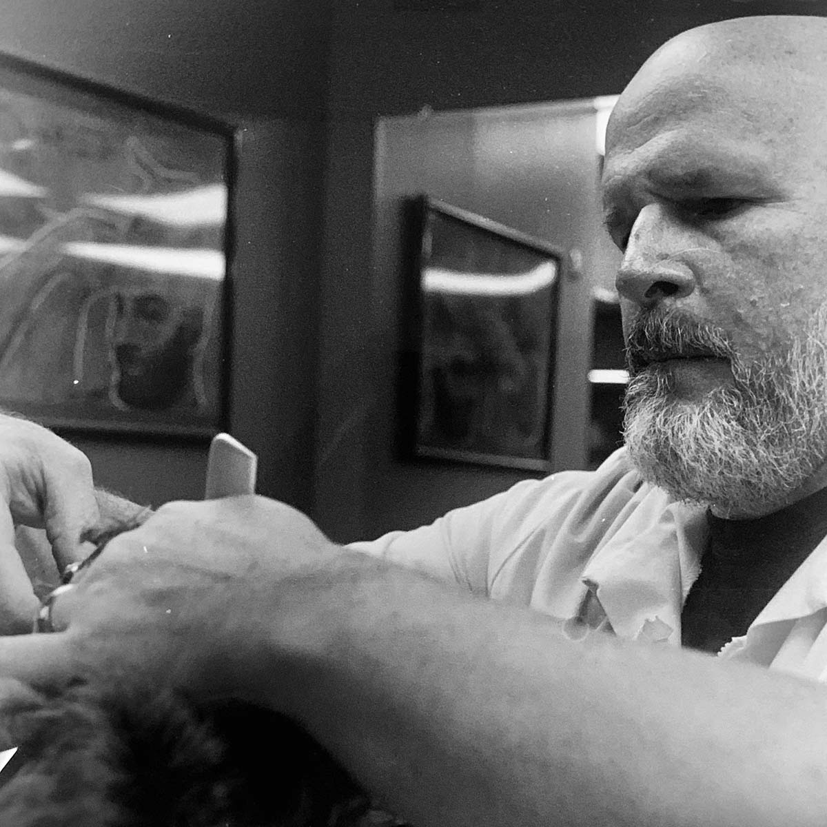 image of a barber cutting hair